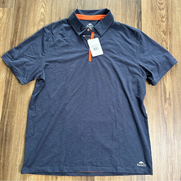 Spectrum Employee Uniform Polo Shirt Mens XL Roots73 Blue Stretch Embroidery NEW - Picture 1 of 10